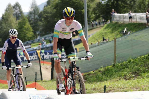 27.08.2026, Daolasa di Commezzadura, Val di Sole Bikeland, 2026 UCI MTB World Championship, WM, Weltmeisterschaft Men Junior s XCO (Cross Country Olympic) Connor Wright 3 (AUS) and Noa Filippi 16 (FRA) Daolasa di Commezzadura Val di Sole Bikeland Trento Italy Copyright: xJustPictures.ch FrancescoxMinghettix jp-en-FrMi-MNG_0177