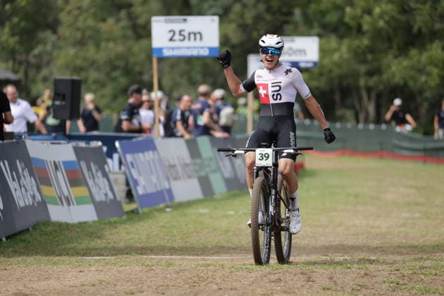 27.08.2026, Daolasa di Commezzadura, Val di Sole Bikeland, 2026 UCI MTB World Championship, WM, Weltmeisterschaft Men Junior s XCO (Cross Country Olympic) Marwan Barhoumi 39 (SUI) arriving in third position Daolasa di Commezzadura Val di Sole Bikeland Trento Italy Copyright: xJustPictures.ch FrancescoxMinghettix jp-en-FrMi-MNG_0384