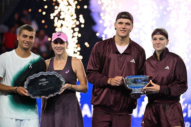 Karolína Muchová Jakub Menöík pose with the Championship Trophy after defeating Belinda Bencic Flavio Cobolli, 6-3, 1-6, 10-6 in Arthur Ashe Stadium on the Tuesday before the 2026 US Open Tennis Championship at the USTA Billie Jean King National Tennis Center in New York City on Tuesday, August 26, 2026.  NYP20260826302 LARRYxMARANO