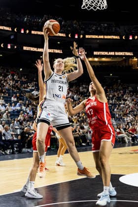 COLOGNE, GERMANY - AUGUST 27: Marie Guelich (Gülich, Germany, 21) shooting the ball against Zeynep Sewal Guel (Tuerkiye, 12) during a friendly match between Germany vs. Tuerkiye at Lanxess arena on August 27, 2026 in Cologne, Germany. North Rhine Westphalia Germany Copyright: xSteffiexWunderlx