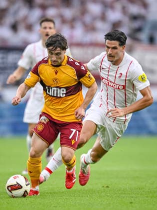 Joe Hodge (Motherwell FC) and Igor MatanoviÄ‡ (SC Freiburg) battle for the ball during the UEFA Conference League 2026 27 Play Off Round Second Leg match between Club Freiburg and Motherwell at Stadion am Wolfswinkel on August 27, 2026 in Freiburg, Germany. (Photo by Harry Langer DeFodi Images) -