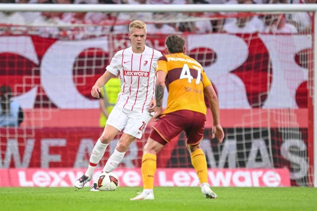 Matthias Ginter (SC Freiburg) and Seb Palmer-Houlden (Motherwell FC) battle for the ball during the UEFA Conference League 2026 27 Play Off Round Second Leg match between Club Freiburg and Motherwell at Stadion am Wolfswinkel on August 27, 2026 in Freiburg, Germany. (Photo by Harry Langer DeFodi Images) -