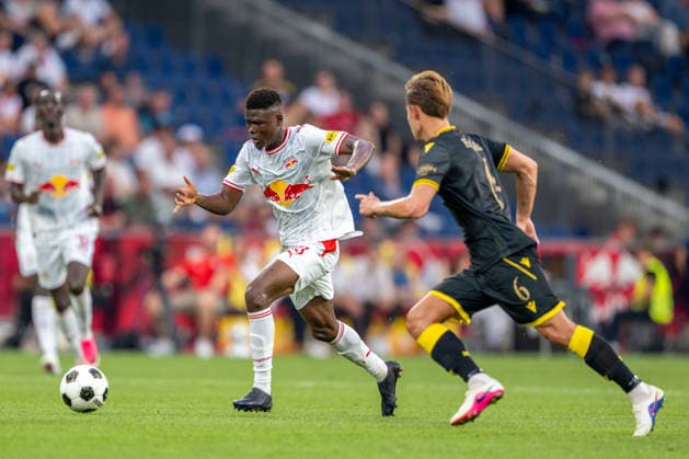 SOCCER - UEFA EL, RBS vs Mjaellby SALZBURG,AUSTRIA,27.AUG.26 - SOCCER - UEFA Europa League, play-off, Red Bull Salzburg vs Mjaellby AIF. Image shows Karim Konate (RBS) and Mads Enggard (Mjaellby).  GEPAxpictures xWolfgangxKofler