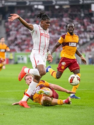 Cyriaque IriÃ (SC Freiburg) and Ewan Wilson (Motherwell FC) battle for the ball during the UEFA Conference League 2026 27 Play Off Round Second Leg match between Club Freiburg and Motherwell at Stadion am Wolfswinkel on August 27, 2026 in Freiburg, Germany. (Photo by Harry Langer DeFodi Images) -