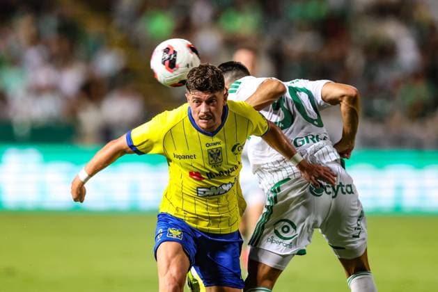 STVV s Arbnor Muja and Omonoia s Nikolas Panagiotou fight for the ball during a soccer game between Cypriot AC Omonia Nicosia and Belgian soccer team Sint-Truidense V.V., Thursday 27 August 2026 in Nicosie, Cyprus, on the return leg of the play-off round for the UEFA Europa League league phase. STVV won the first leg 1-0. BRUNOxFAHY  x184503125x