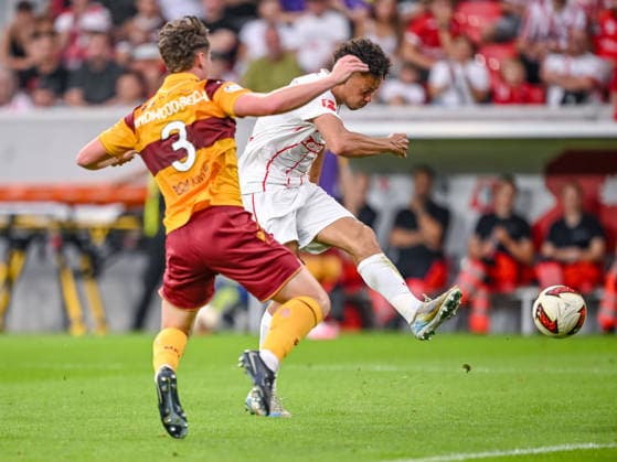Jake Girdwood-Reich (Motherwell FC) and Derry Scherhant (SC Freiburg) battle for the ball during the UEFA Conference League 2026 27 Play Off Round Second Leg match between Club Freiburg and Motherwell at Stadion am Wolfswinkel on August 27, 2026 in Freiburg, Germany. (Photo by Harry Langer DeFodi Images) -