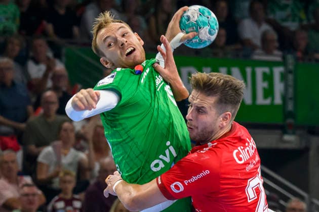 im Bild v.l.: Mathias Gidsel (Fuechse Berlin, 19), im Zweikampf, GER, Berlin, Handball, Fuechse Berlin vs MT Melsungen, in der Max-Schmeling-Halle, 27.08.2026, Copyright: HMBxMedia UwexKoch