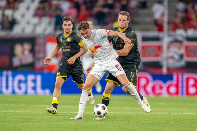SOCCER - UEFA EL, RBS vs Mjaellby SALZBURG,AUSTRIA,27.AUG.26 - SOCCER - UEFA Europa League, play-off, Red Bull Salzburg vs Mjaellby AIF. Image shows Jacob Bergstroem (Mjaellby), Bartosz Mazurek (RBS) and Jesper Gustavsson (Mjaellby).  GEPAxpictures xWolfgangxKofler