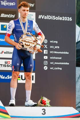 TRENTO, ITALY - AUGUST 27: Luca Martin from France receive his trophy during the Uci Mountainbike World Championship, WM, Weltmeisterschaft - Men Elite Cross-County Short Track World Championships at Val di Sole on August 27, 2026 in Trento, Italy. Copyright: xJustPictures.ch FrancescoxMinghettix jp-en-EuSpIm-_NG_0359