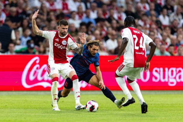 2026-08-27 UEFA Conference League: AFC Ajax v FC Sion AMSTERDAM, NETHERLANDS - AUGUST 27: Caio Henrique and Jorthy Mokio of AFC Ajax and Numa Lavanchy of FC Sion during the UEFA Conference League match between AFC Ajax and FC Sion at Johan Cruijff Arena on August 27, 2026 in Amsterdam, Netherlands. Amsterdam Johan Cruijff Arena Netherlands Content not available for redistribution in The Netherlands directly or indirectly through any third parties. Copyright: xMarcelxvanxPlateringenx