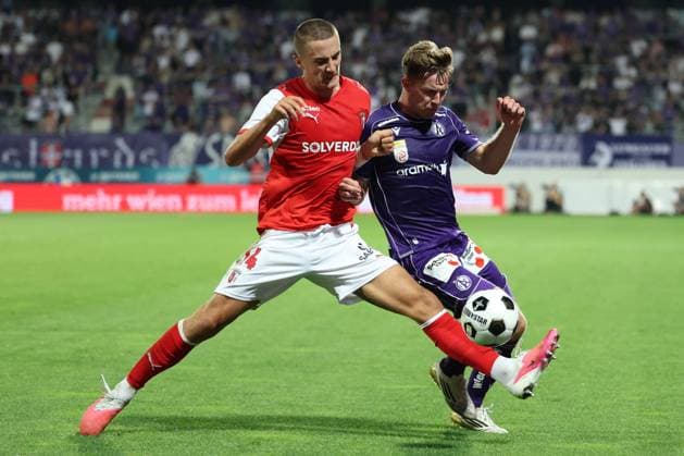 27.August.2026 - SOCCER - 2026 27 UEFA Conference League Play-offs, 2nd Leg, FK Austria Wien vs Sporting Braga Gustaf Lagerbielke (SC Braga) and Johannes Eggestein (Austria Wien) in one-on-one Vienna Franz-Horr-Stadion (Generali-Arena) Vienna Austria Copyright: xYigitxOermex xPsxImagesxYigitxOermex xPsxImagesx