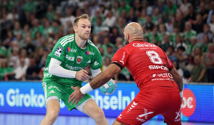 Mathias Gidsel am Ball, Adrian Sipos Zweikampf Spielszene Aktion Handball HBL Bundesliga Herren 1. Spieltag Saison 2026 2027 27.08.2026 Füchse Berlin vs MT Melsungen