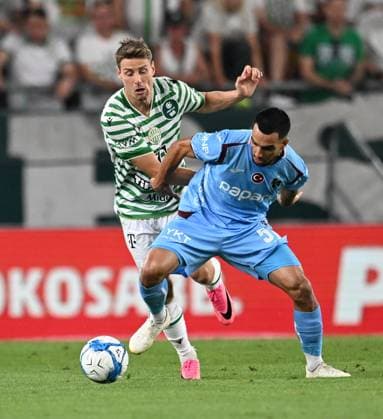 Ferencvaros v Trabzonspor - UEFA Europa League BUDAPEST, HUNGARY - AUGUST 27: Trabzonspor player Melih Kabasakal (R) in action against an opponent during the UEFA Europa League play-off second-leg match between Ferencvaros and Trabzonspor at Groupama Stadium in Budapest, Hungary on August 27, 2026. Hakan Burak Altunoz Anadolu Budapest Hungary. Editorial use only. Please get in touch for any other usage.  Copyright: x2026xAnadoluxHakanxBurakxAltunozx