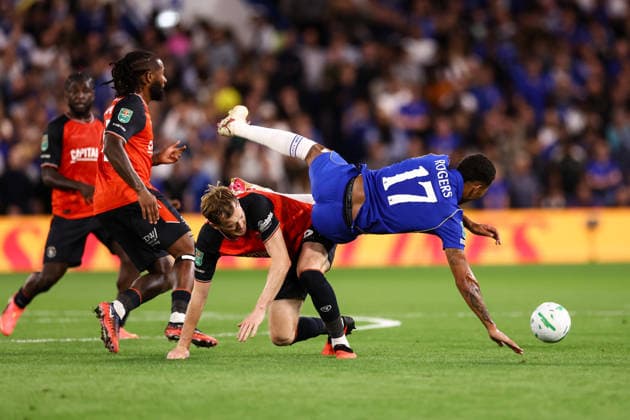 Chelsea v Luton Town 27 August 2026, London - Carabao Cup Second Round - Chelsea v Luton Town - George Johnston of Luton Town trips Morgan Rogers of Chelsea - Photo: Jacques Feeney Offside. London UK Copyright: xJacquesxFeeneyx xOffsidexOffside
