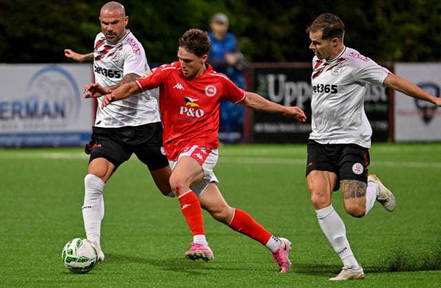 UEFA Europa Conference League Play-off Second Leg, Inver Park, Antrim 27 8 2026 Larne vs Lincoln Red Imps Larne™s Matty Lusty with Imp™s Mariano Gonzalez Maroto Matty Lusty with Mariano Gonzalez Maroto 27 8 2026  Copyright: xx Larne v Imps-021