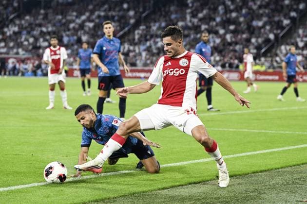 AMSTERDAM - Marquinhos of Sion, Lucas Rosa of Ajax (lr) during the UEFA Conference League match between AFC Ajax and Sion at the Johan Cruijff ArenA on 27 August 2026 in Amsterdam, the Netherlands. OLAF KRAAK ANP xVIxANPxSportx xxANPxIVx 566392805 originalFilename: 566392805.jpg