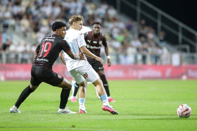 HNK Rijeka v Midtjylland - UEFA Conference League 2026 27 Play Off Round Second Leg RIJEKA, CROATIA - AUGUST 27: Pedro Bravo of FC Midtjylland and Toni Fruk of HNK Rijeka compete for a ball in action during the UEFA Conference League 2026 27 Play Off Round Second Leg match between HNK Rijeka and FC Midtjylland at Stadion HNK Rijeka on August 27, 2026 in Rijeka, Croatia.  GoranxKovacic PIXSELL