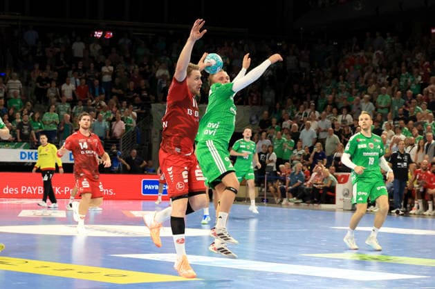 27.08.2026, GER Deutschland, Handball, 1.Bundesliga, 27.08.2026, Saison 2026 2027, Berlin, Fuechse Berlin vs Melsungen Tobias Grondahl ( Fuechse Berlin 15 ), Dimitri Ignatow ( MT Melsungen 11 ) Berlin Max-Schmeling-Halle Berlin Deutschland Copyright: xNordphotox xEnglerx
