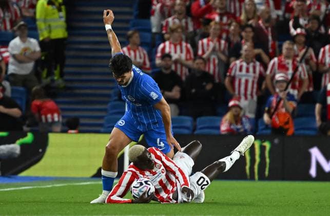 Pascak Struijk of Brighton collides with Ieltsin Camoes of Tromso during the Europa Conference League Qualifying match between Brighton and Hove Albion and Tromso at the American Express Stadium, Brighton UK - Thursday 27th August 2026 Brighton v Tromso Europa Conference League 2026, Amex Stadium, Sussex, UK - 27 Aug 2026Brighton Amex Stadium Sussex United Kingdom Editorial use only. No merchandising. For Football images FA and Premier League restrictions apply inc. no internet mobile usage without FAPL license - for details contact Football Dataco  Copyright: xLizxFinlayson TPI Shutterstockx 17121964ch
