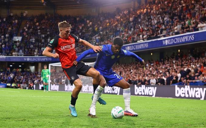 Callum Marshall of Luton Town and Jorrel Hato of Chelsea Chelsea v Luton Town, EFL Carabao Cup, Second Round, Football, Stamford Bridge, London, UK - 27 Aug 2026London Stamford Bridge United Kingdom EDITORIAL USE ONLY No use with unauthorised audio, video, data, fixture lists, club league logos or live services. Online in-match use limited to 120 images, no video emulation. No use in betting, games or single club league player publications.  Copyright: xMichaelxZemanek Shutterstockx 17118945bs