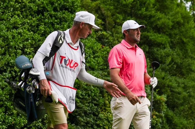 August 27, 2026, Atlanta, Georgia, USA: Scottie Scheffler (USA)(R) and his caddie Ted Scott walk off the 12th tee during the first round of the 2026 TOUR Championship at East Lake Golf Club. PGA, Golf Herren 2026: TOUR Championship - Round 1  - ZUMAw109 20260827_fap_w109_031 Copyright: xDebbyxWongx