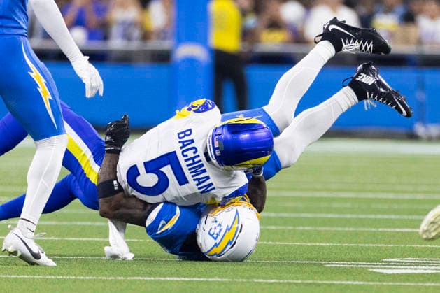 August 27, 2026, Inglewood, California, USA: Los Angeles Rams Wide Receiver Alex Bachman (5) is brought down by Los Angeles Chargers Linebacker Del Shawn Phillips (53) during an NFL, American Football Herren, USA football preseason game, in Inglewood, Calif. on Thursday August 27, 2026. Inglewood USA - ZUMAc68_ 20260827_zaf_c68_007 Copyright: xRingoxChiux