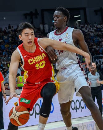 Qatar v China - FIBA Basketball World Cup 2027 Asian Qualifiers Wang Junjie (L) of China and Abbasher Mohammed (R) of Qatar in action during the second-round match between China and Qatar in the FIBA Basketball World Cup Asian Qualifiers at Al Janoub Stadium in Al Wakrah, Qatar, August 27, 2026. DOHA Qatar Copyright: xNOUSHADx