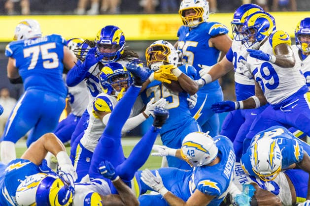 August 27, 2026, Inglewood, California, USA: Los Angeles Chargers Running Back Amar Johnson (35) runs the ball fighting off pressure from Los Angeles Rams during an NFL, American Football Herren, USA football preseason game, in Inglewood, Calif. on Thursday August 27, 2026. NHL, Eishockey Herren, USA 2026: LA Rams 20:18 LA Chargers - ZUMAc68_ 20260827_zaf_c68_037 Copyright: xRingoxChiux