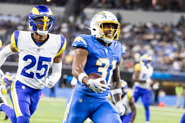 August 27, 2026, Inglewood, California, USA: Los Angeles Chargers Running Back Gregory Desrosiers (31) runs past Los Angeles Rams Cornerback Nyzier Fourqurean (25) and scores during an NFL, American Football Herren, USA football preseason game, in Inglewood, Calif. on Thursday August 27, 2026. Inglewood USA - ZUMAc68_ 20260827_zaf_c68_048 Copyright: xRingoxChiux