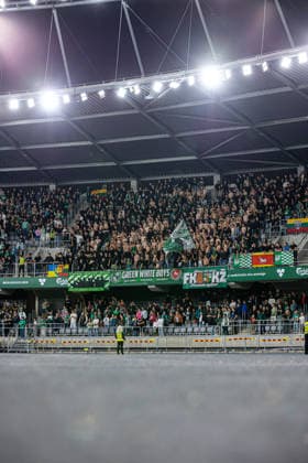 UEFA Europa League play-offs, 2nd leg – Kauno Žalgiris vs Besiktas at Dariaus ir Gireno Stadium, Kaunas, Lithuania. Kauno Zalgiris supporters attend the UEFA Europa League play-offs second leg match between Kauno Zalgiris and Besiktas at Dariaus ir Gireno Stadium in Kaunas, Lithuania. Kaunas Kaunas Lithuania