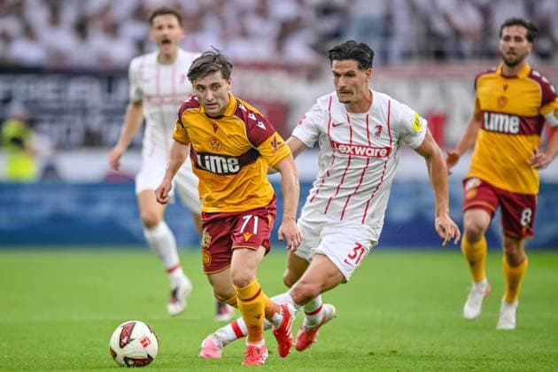 Joe Hodge (Motherwell FC) and Igor MatanoviÄ‡ (SC Freiburg) battle for the ball during the UEFA Conference League 2026 27 Play Off Round Second Leg match between Club Freiburg and Motherwell at Stadion am Wolfswinkel on August 27, 2026 in Freiburg, Germany. (Photo by Harry Langer DeFodi Images) -