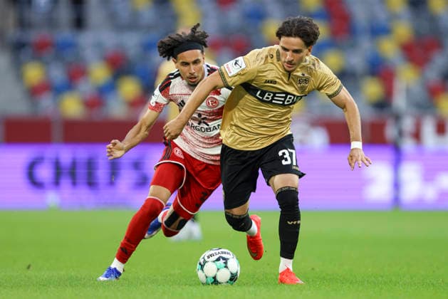Anas Slimani (Fortuna Duesseldorf) und David Preu (VfB Stuttgart II) im Zweikampf waehrend des Spiels der 3. Liga zwischen Fortuna Duesseldorf und VfB Stuttgart II, Merkur Spiel-Arena am 28. August 2026 in Duesseldorf, Deutschland. (Foto von Oliver Kaelke DeFodi Images) +++ Anas Slimani (Fortuna Duesseldorf) und David Preu (VfB Stuttgart II) battle for the ball during the 3. Liga match between Fortuna Duesseldorf and VfB Stuttgart II at Merkur Spiel-Arena on August 28, 2026 in Dusseldorf, Germany. (Photo by Oliver Kaelke DeFodi Images) DFB DFL REGULATIONS PROHIBIT ANY USE OF PHOTOGRAPHS AS IMAGE SEQUENCES AND OR QUASI-VIDEO. (Photo by Oliver Kaelke DeFodi Images) -