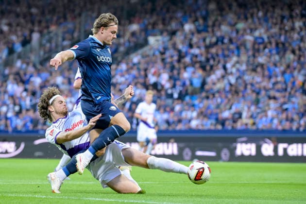 Joel Bu Hanna (VfL Osnabrueck) und Christian Rasmussen (VfL Bochum) im Kampf um den Ball waehrend des spiels der 2. Bundesliga zwischen VfL Bochum und VfL Osnabrueck, Vonovia Ruhrstadion am 28. August 2026 in Bochum, Deutschland. (Foto von Max Maiwald DeFodi Images) +++ Joel Bu Hanna (VfL Osnabrueck) und Christian Rasmussen (VfL Bochum) battle for the ball during the 2nd Bundesliga match between VfL Bochum and VfL Osnabrueck at Vonovia Ruhrstadion on August 28, 2026 in Bochum, Germany. (Photo by Max Maiwald DeFodi Images) DFB DFL REGULATIONS PROHIBIT ANY USE OF PHOTOGRAPHS AS IMAGE SEQUENCES AND OR QUASI-VIDEO. (Photo by Max Maiwald DeFodi Images) - *** Joel Bu Hanna of VfL Osnabrück and Christian Rasmussen of VfL Bochum battle for the ball during the 2. Bundesliga match between VfL Bochum and VfL Osnabrück at the Vonovia Ruhrstadion on August 28, 2026, in Bochum, Germany Photo by Max Maiwald DeFodi Images Joel Bu Hanna of VfL Osnabrück and Christian Rasmussen of VfL Bochum battle for the ball during the 2nd Bundesliga match between VfL Bochum and VfL Osnabrück at Vonovia Ruhrstadion on August 28, 2026 in Bochum, Germany. Photo by Max Maiwald, DeFodi Images. DFB and DFL regulations prohibit any use of photographs as image sequences and or quasi-video. Photo by Max Maiwald, DeFodi Images.