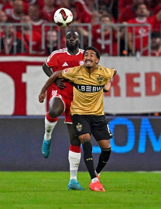 28.08.2026, Fussball Bundesliga 2026 2027, 1.Spieltag, FC Bayern München - VfB Stuttgart, in der Allianz-Arena München, v.l. Dayot Upamecano (FC Bayern München) gegen Tiago Tomas (Stuttgart) ***DFL and DFB regulations prohibit any use of photographs as image sequences and or quasi-video.*** *** August 28, 2026, 2026–2027 Bundesliga, Matchday 1, FC Bayern Munich vs. VfB Stuttgart, at the Allianz Arena in Munich, from left: Dayot Upamecano (FC Bayern Munich) vs. Tiago Tomas (Stuttgart) ***DFL and DFB regulations prohibit any use of photographs as image sequences and or quasi-video***