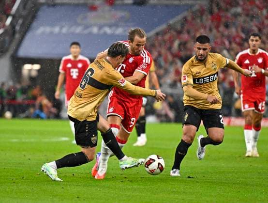 28.08.2026, Fussball Bundesliga 2026 2027, 1.Spieltag, FC Bayern München - VfB Stuttgart, in der Allianz-Arena München, v.l. Angelo Stiller (Stuttgart) gegen Harry Kane (FC Bayern München) , Deniz Undav (Stuttgart) ***DFL and DFB regulations prohibit any use of photographs as image sequences and or quasi-video.*** *** August 28, 2026, 2026–2027 Bundesliga Season, Matchday 1, FC Bayern Munich vs. VfB Stuttgart, at the Allianz Arena in Munich, from left: Angelo Stiller (Stuttgart) vs. Harry Kane (FC Bayern Munich), Deniz Undav (Stuttgart) ***DFL and DFB regulations prohibit any use of photographs as image sequences and or quasi-video***