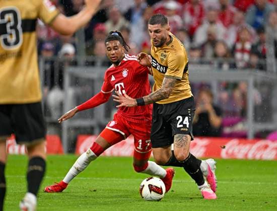 28.08.2026, Fussball Bundesliga 2026 2027, 1.Spieltag, FC Bayern München - VfB Stuttgart, in der Allianz-Arena München, v.l. Michael Olise (FC Bayern München) gegen Jeff Chabot (Stuttgart) ***DFL and DFB regulations prohibit any use of photographs as image sequences and or quasi-video.*** *** August 28, 2026, 2026–2027 Bundesliga, Matchday 1, FC Bayern Munich vs. VfB Stuttgart, at the Allianz Arena in Munich, from left: Michael Olise (FC Bayern Munich) vs. Jeff Chabot (Stuttgart) ***DFL and DFB regulations prohibit any use of photographs as image sequences and or quasi-video***