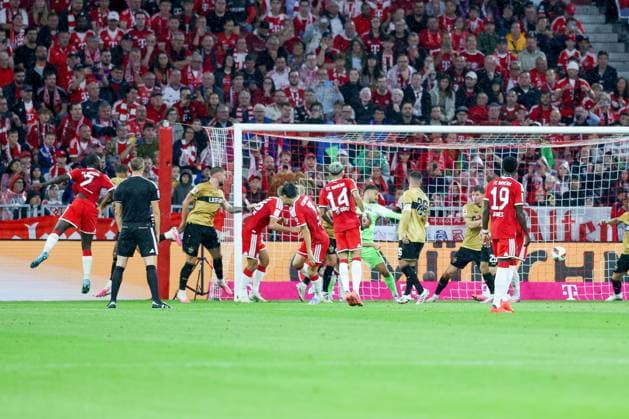 Dayot Upamecano 2 (FC Bayern Muenchen) trifft das Tor zum 1:0, Fabian Bredlow 1 (VfB stuttgart), FC Bayern Muenchen vs. VfB Stuttgart, Fussball, 1. Bundesliga, 1. Spieltag, 28.08.2026 DFL DFB regulations prohibit any use of photographs as image sequences and or quasi-video Muenchen Bayern Deutschland *** Dayot Upamecano 2, FC Bayern Munich scores the goal to make it 1–0; Fabian Bredlow 1, VfB Stuttgart; FC Bayern Munich vs. VfB Stuttgart; Soccer; Bundesliga 1; Matchday 1, August 28, 2026. DFL and DFB regulations prohibit any use of photographs as image sequences and or quasi-video. Munich, Bayern, Germany Copyright: xkolbert-press ChristianxKolbertx