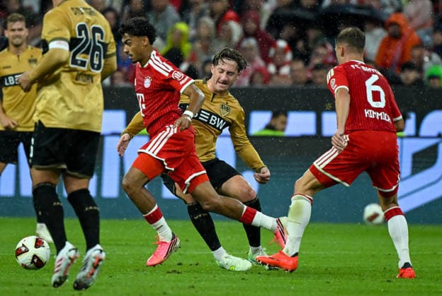 28.08.2026, xemx, Fussball 1.Bundesliga, FC Bayern Muenchen - VfB Stuttgart v.l. Nathaniel Brown (FC Bayern Muenchen), Angelo Stiller (VfB Stuttgart) Zweikampf, Aktion, action, battle for the ball (DFL DFB REGULATIONS PROHIBIT ANY USE OF PHOTOGRAPHS as IMAGE SEQUENCES and or QUASI-VIDEO) Muenchen *** August 28, 2026, xemx, Soccer, Bundesliga 1, FC Bayern Munich vs. VfB Stuttgart, Nathaniel Brown, FC Bayern Munich, Angelo Stiller, VfB Stuttgart, tackle, action, battle for the ball. DFL and DFB regulations prohibit any use of photographs as image sequences and or quasi-video. Munich