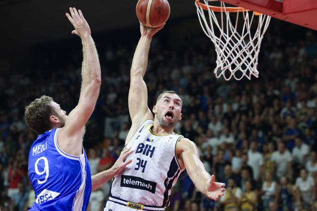 IPA87873568 - Nicolo Melli of Italy and Kenan Kamenjas of Bosnia and Herzegovina are in action during the FIBA Basketball World Cup 2027 Group J European Qualifiers game between Bosnia and Herzegovina and Italy at SKPC Mejdan on August 28, 2026, in Tuzla, Bosnia and Herzegovina during the Bosnia and Herzegovina vs. Italy match—Second Round · Group J - WCQ’27, FIBA World Cup in , , August 28, 2026  Copyright: x(c)xAlbertoxCavallaro SportReporter IPAxSportx xx 87873568