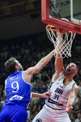IPA87873570 - Nicolo Melli of Italy and Kenan Kamenjas of Bosnia and Herzegovina are in action during the FIBA Basketball World Cup 2027 Group J European Qualifiers game between Bosnia and Herzegovina and Italy at SKPC Mejdan on August 28, 2026, in Tuzla, Bosnia and Herzegovina during the Bosnia and Herzegovina vs. Italy match—Second Round · Group J - WCQ’27, FIBA World Cup in , , August 28, 2026  Copyright: x(c)xAlbertoxCavallaro SportReporter IPAxSportx xx 87873570