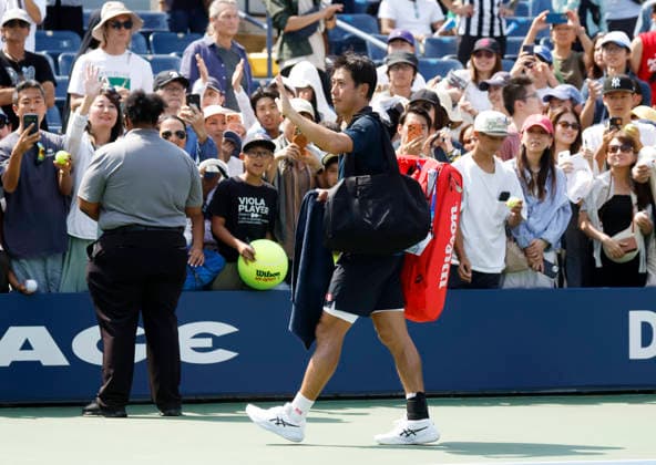 Kei Nishikori of Japan reacts as he walks off of the court after his straight sets defeat to Rei Sakamoto of Japan in a qualifying final round match at the 2026 US Open Tennis Championship at the USTA Billie Jean King National Tennis Center in New York City on Friday, August 28, 2026. This was Nishikori s final Grand Slam appearance.  NYP20260828142 JOHNxANGELILLO