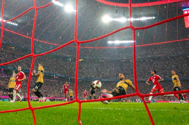 28.08.2026, Fussball Bundesliga 2026 2027, 1.Spieltag, FC Bayern München - VfB Stuttgart, in der Allianz-Arena München, Josha Vagnoman (re, am Boden, Stuttgart) erzielt ein Eigentor zum 1:3 ***DFL and DFB regulations prohibit any use of photographs as image sequences and or quasi-video.*** *** August 28, 2026, 2026–2027 Bundesliga, Matchday 1, FC Bayern Munich vs. VfB Stuttgart, at the Allianz Arena in Munich, Josha Vagnoman (referee), on the ground, Stuttgart scores an own goal to make it 1–3 ***DFL and DFB regulations prohibit any use of photographs as image sequences and or quasi-video***