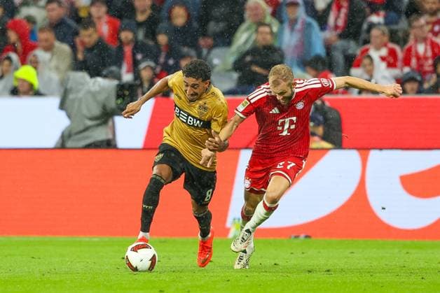 im Zweikampf, Aktion, mit Tiago Tomas 8 (VfB Stuttgart), Konrad Laimer 27 (FC Bayern Muenchen), FC Bayern Muenchen vs. VfB Stuttgart, Fussball, 1. Bundesliga, 1. Spieltag, 28.08.2026 DFL DFB regulations prohibit any use of photographs as image sequences and or quasi-video Muenchen Bayern Deutschland *** One-on-one, action, featuring Tiago Tomas 8 (VfB Stuttgart) and Konrad Laimer 27 (FC Bayern Munich), FC Bayern Munich vs. VfB Stuttgart, soccer, Bundesliga 1, Matchday 1, August 28, 2026. DFL and DFB regulations prohibit any use of photographs as image sequences and or quasi-video. Munich, Bayern, Germany Copyright: xkolbert-press ChristianxKolbertx