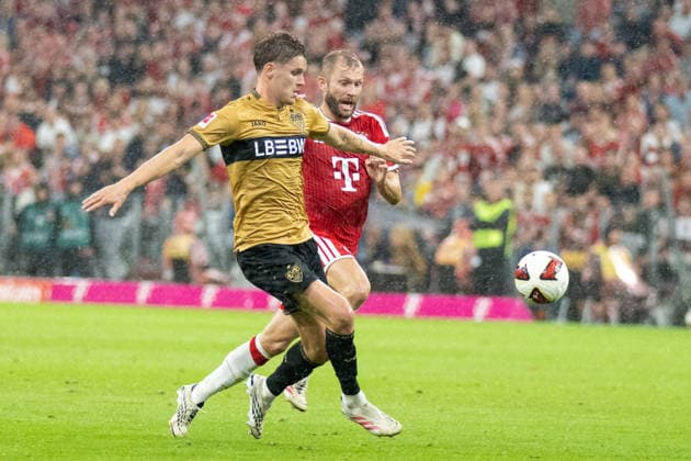 Konrad Laimer 27 (FC Bayern Muenchen) im Zweikampf, FC Bayern Muenchen - VfB Stuttgart, Fussball Bundesliga, 1. Spieltag, 28.08.2026 DFB regulations prohibit any use of photographs as image sequences and or quasi-video Muenchen Bayern Deutschland *** Konrad Laimer, 27, FC Bayern Munich in a tackle; FC Bayern Munich vs. VfB Stuttgart; Bundesliga; Matchday 1; August 28, 2026. DFB regulations prohibit any use of photographs as image sequences and or quasi-video. Munich, Bayern, Germany Copyright: xkolbert-press UlrichxGamelx