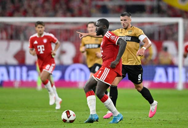Zweikampf, Aktion Dayot Upamecano FC Bayern Muenchen FCB (02) gegen Ermedin Demirovic VfB Stuttgart (09) FC Bayern Muenchen FCB vs VfB Stuttgart 28.08.2026 DFL REGULATIONS PROHIBIT ANY USE OF PHOTOGRAPHS AS IMAGE SEQUENCES AND OR QUASI-VIDEO FC Bayern Muenchen FCB vs VfB Stuttgart *** Tackle, Action: Dayot Upamecano (FC Bayern Munich, FCB 02) vs. Ermedin Demirovic (VfB Stuttgart, 09) FC Bayern Munich (FCB) vs. VfB Stuttgart August 28, 2026 DFL regulations prohibit any use of photographs as image contentSEQUENCES AND OR QUASI-VIDEO FC Bayern Munich FCB vs. VfB Stuttgart