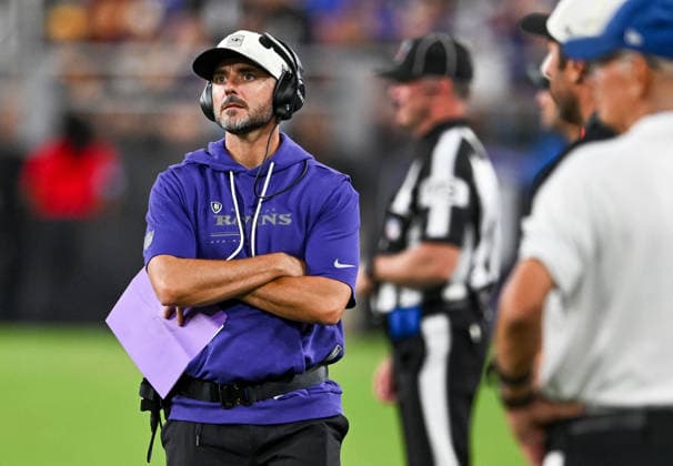 Baltimore Ravens head coach Jesse Minter walks the sideline against the Washington Commanders during the fourth quarter of a preseason game at M&T Bank Stadium in Baltimore, Maryland, on Friday, August 28, 2026. The Ravens won 41-3.  BAL20260828118 DAVIDxTULIS