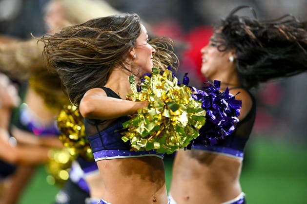Baltimore Ravens cheerleaders perform against the Washington Commanders during the fourth quarter of a preseason game at M&T Bank Stadium in Baltimore, Maryland, on Friday, August 28, 2026. The Ravens won 41-3.  BAL20260828119 DAVIDxTULIS