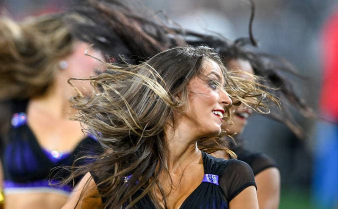 Baltimore Ravens cheerleaders perform against the Washington Commanders during the fourth quarter of a preseason game at M&T Bank Stadium in Baltimore, Maryland, on Friday, August 28, 2026. The Ravens won 41-3.  BAL20260828120 DAVIDxTULIS