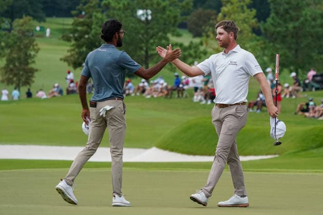 August 28, 2026, Atlanta, Georgia, USA: Ryan Gerard (USA) (R) and Akshay Bhatia (USA) shake hands on the 18th green after the second round of the 2026 TOUR Championship at East Lake Golf Club. PGA, Golf Herren 2026: TOUR Championship - Round 2  - ZUMAw109 20260828_fap_w109_066 Copyright: xDebbyxWongx