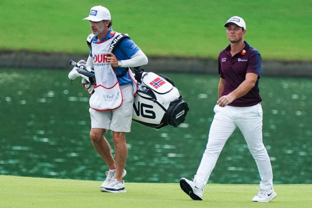 August 28, 2026, Atlanta, Georgia, USA: Viktor Hovland (NOR)(R) and his caddie, Shay Knight approach the 18th green during the second round of the 2026 TOUR Championship at East Lake Golf Club. PGA, Golf Herren 2026: TOUR Championship - Round 2  - ZUMAw109 20260828_fap_w109_071 Copyright: xDebbyxWongx